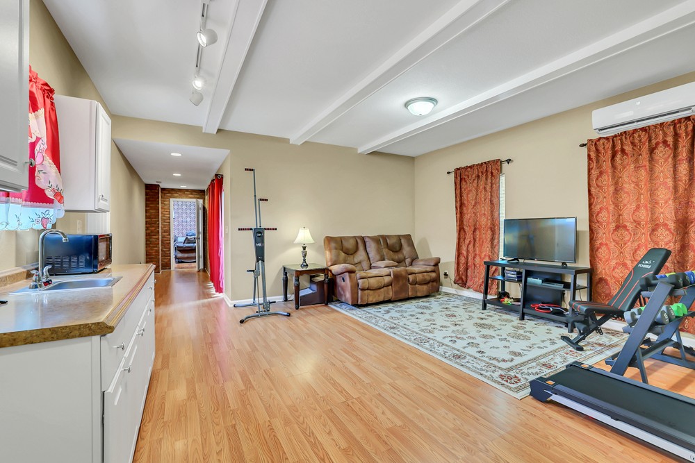 1775 Beckwith Road Mount Juliet, TN 37122 - Photo 54 of 64 a living room with furniture and a flat screen tv