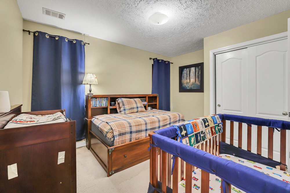 1775 Beckwith Road Mount Juliet, TN 37122 - Photo 58 of 64 a bedroom with a bed and a window