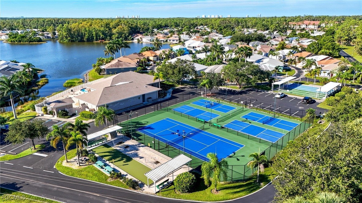 10733 Rio Mar Circle Estero, FL 33928 - Photo 26 of 40 an aerial view of a house with outdoor space and lake view