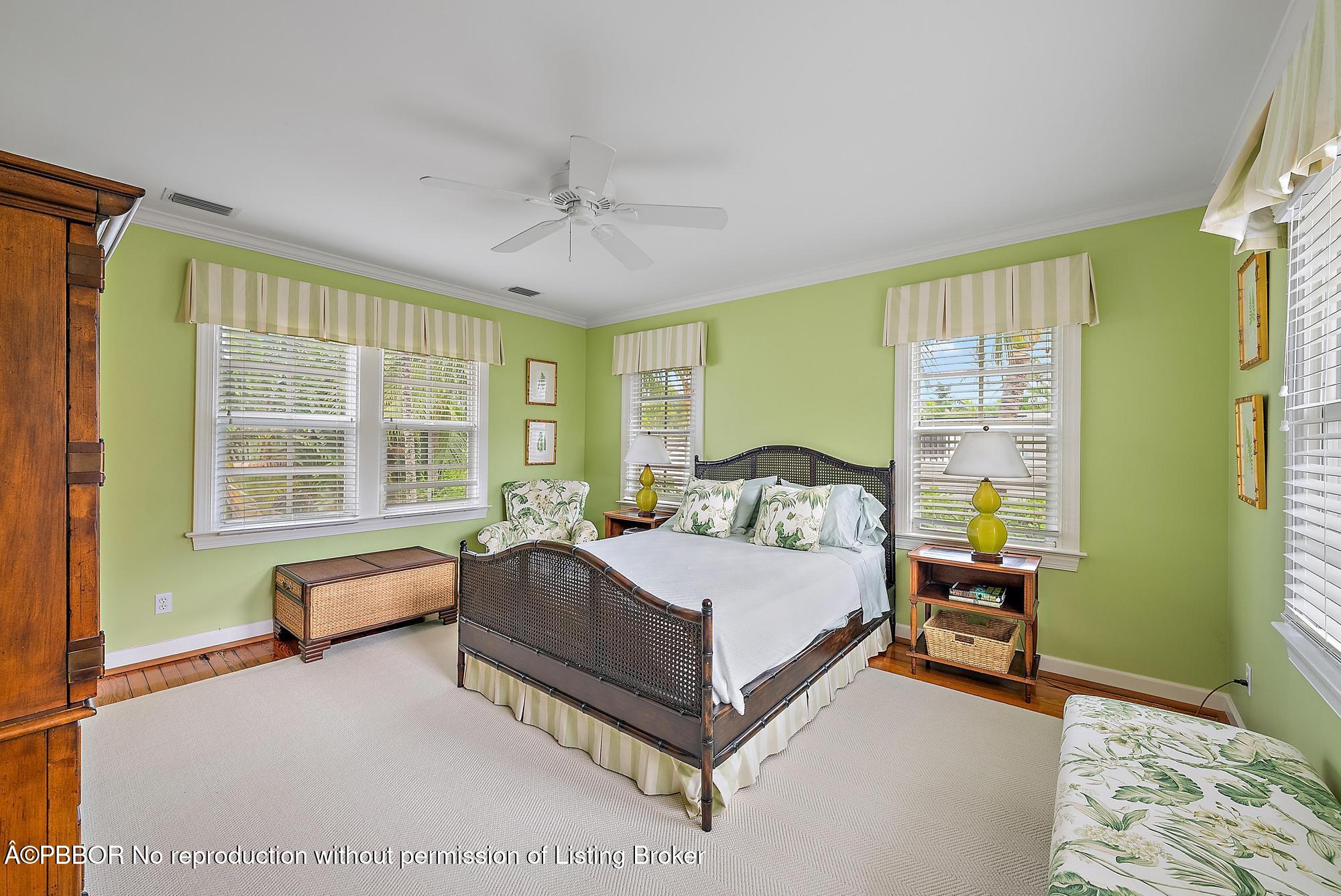 325 Seaspray Avenue Palm Beach, FL 33480 - Photo 11 of 14 a spacious bedroom with a bed couch and a window
