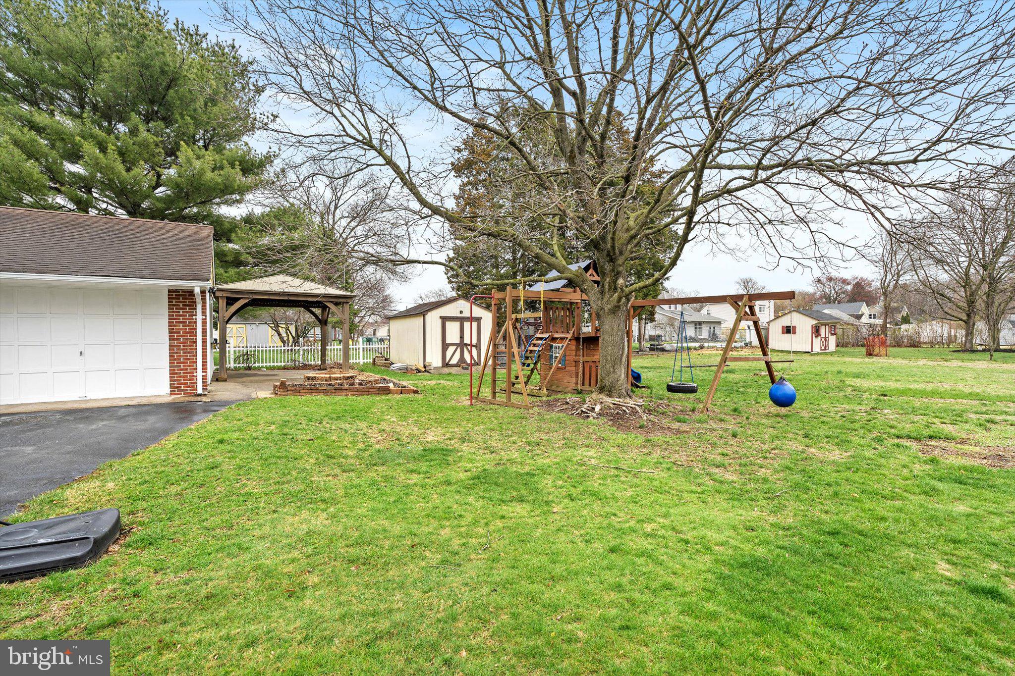446 Trinity Avenue Hamilton, NJ 08619 - Photo 29 of 31 a view of a house with backyard and tree