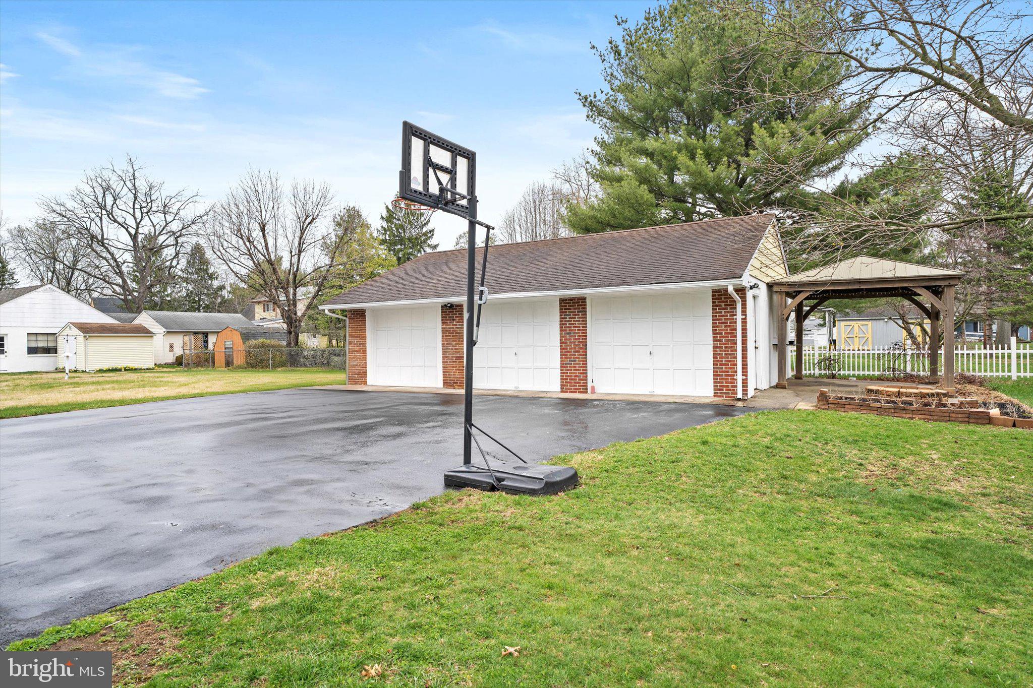 446 Trinity Avenue Hamilton, NJ 08619 - Photo 30 of 31 a view of a house with backyard and a tree