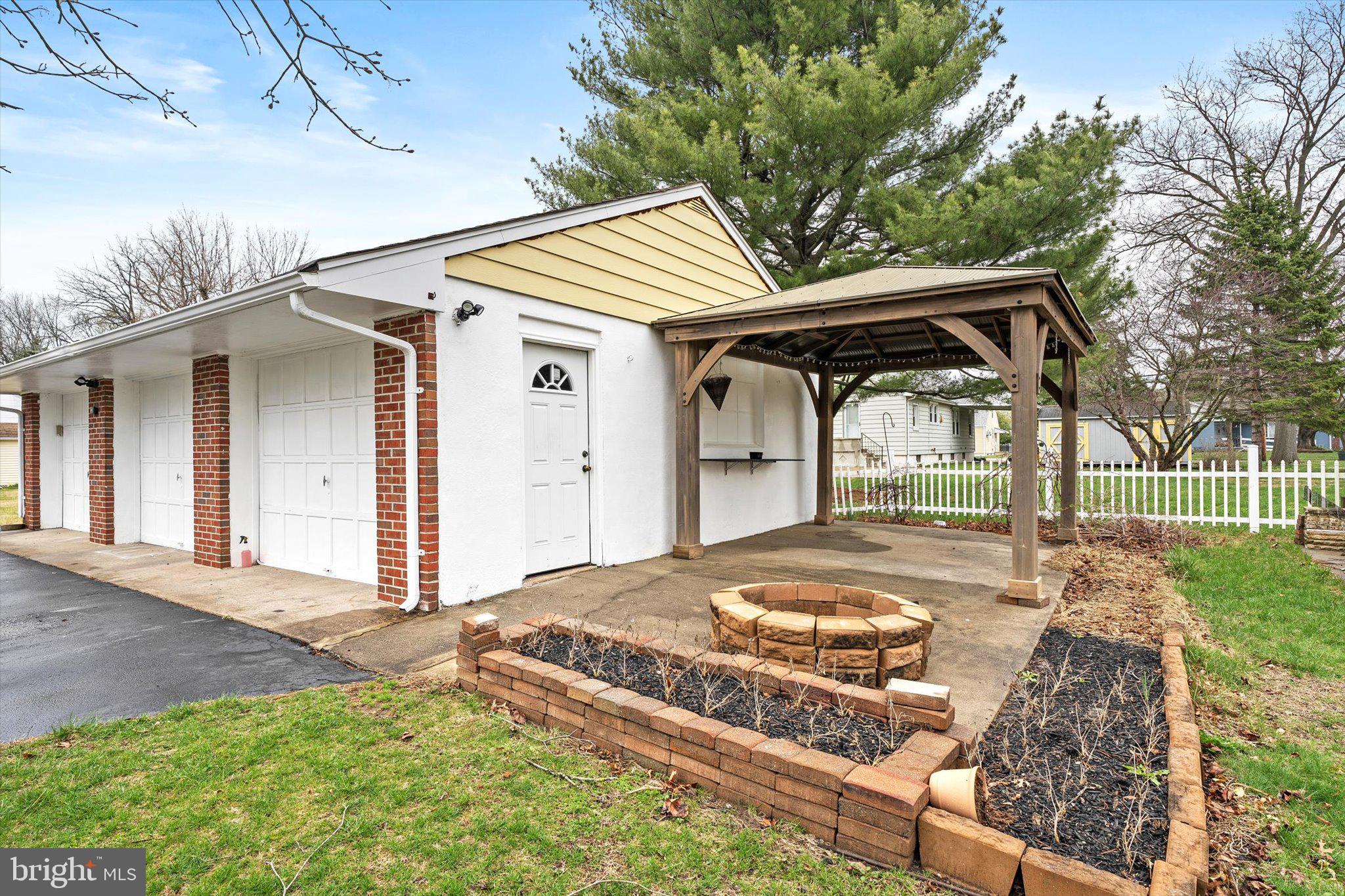 446 Trinity Avenue Hamilton, NJ 08619 - Photo 31 of 31 a front view of a house with garden