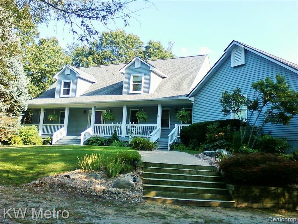 2211 West Wardlow Road Highland, MI 48357 - Photo 3 of 53 Front in Spring/summer