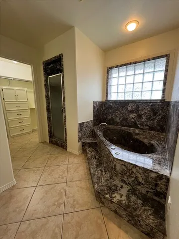 a view of a swimming pool with a yard