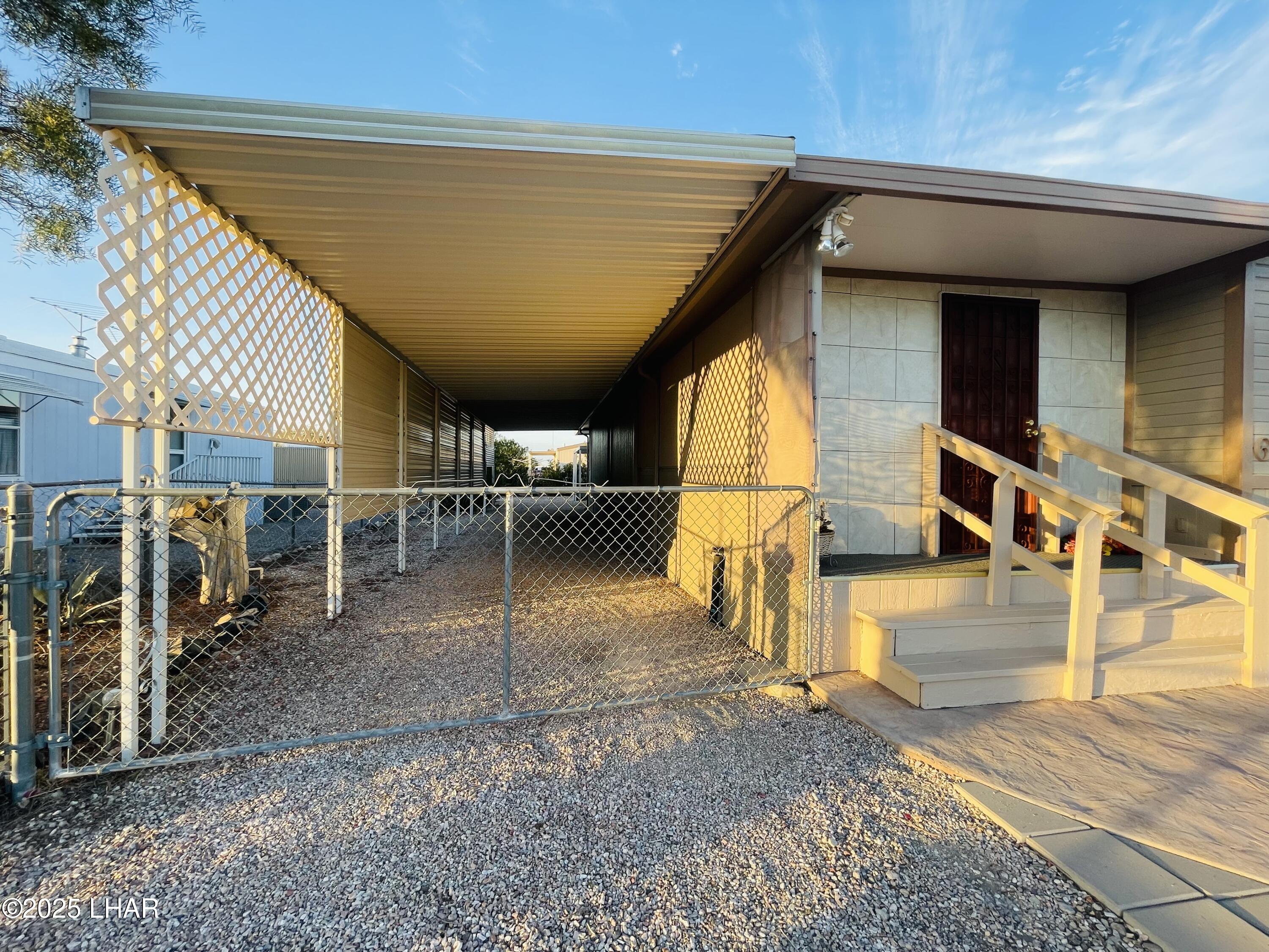 676 Hagley Loop Quartzsite, AZ 85346 - Photo 29 of 49 Carport to Garage entrance