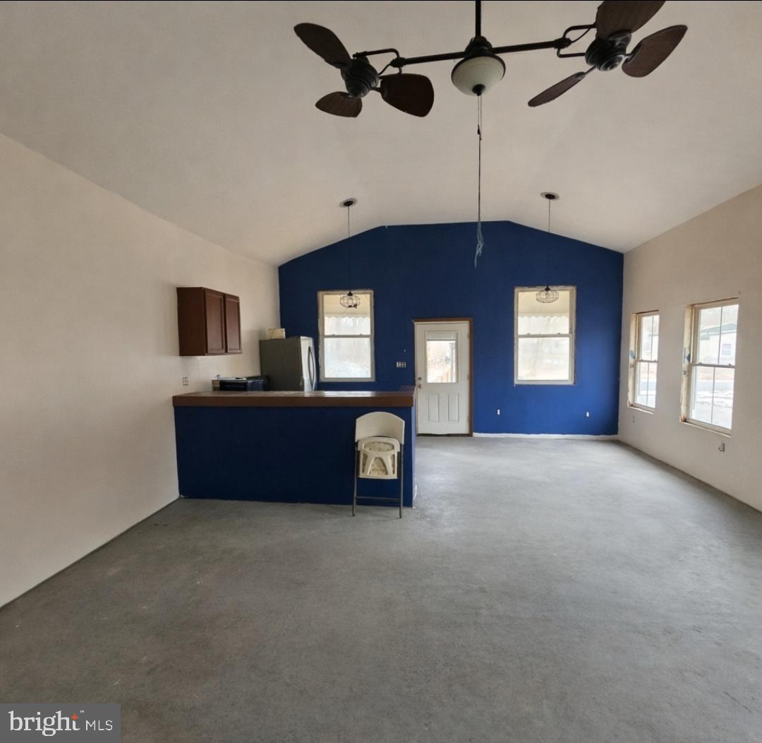 345 Jute Road Millville, NJ 08332 - Photo 12 of 18 a living room with furniture and a ceiling fan