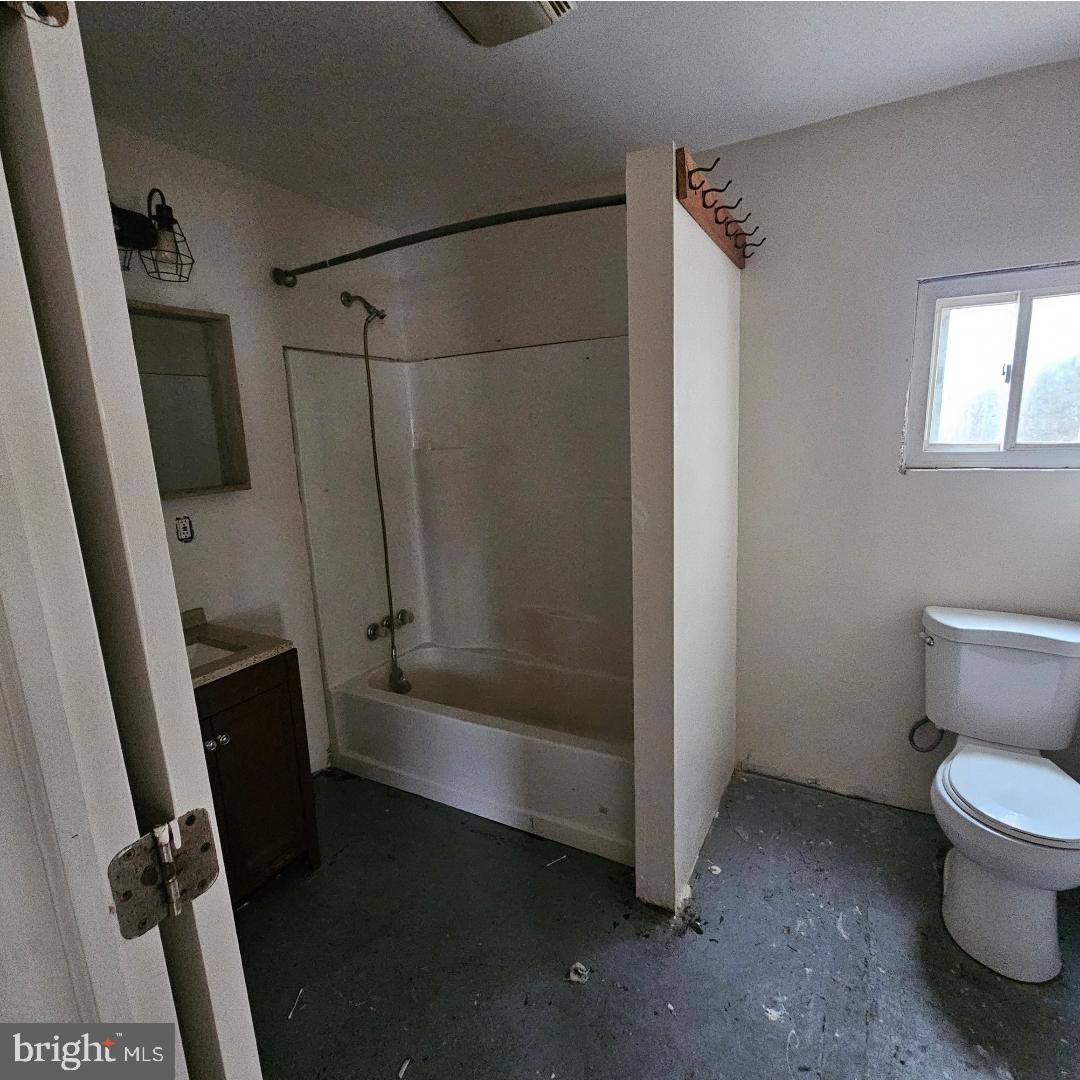 345 Jute Road Millville, NJ 08332 - Photo 18 of 18 a bathroom with a toilet and a tub