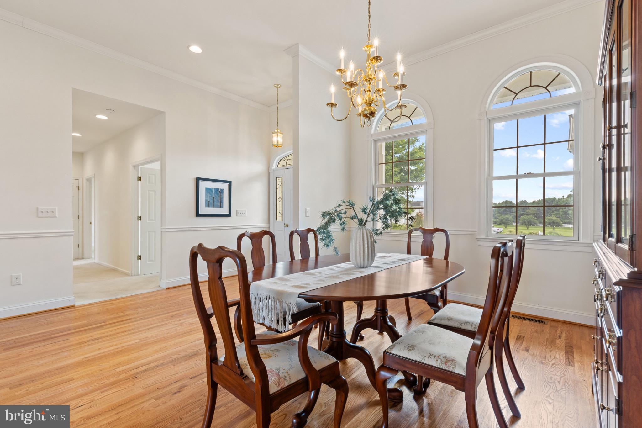 203 Beck Farm Road Centreville, MD 21617 - Photo 8 of 46 Dining Area with crown & chair-rail moldings