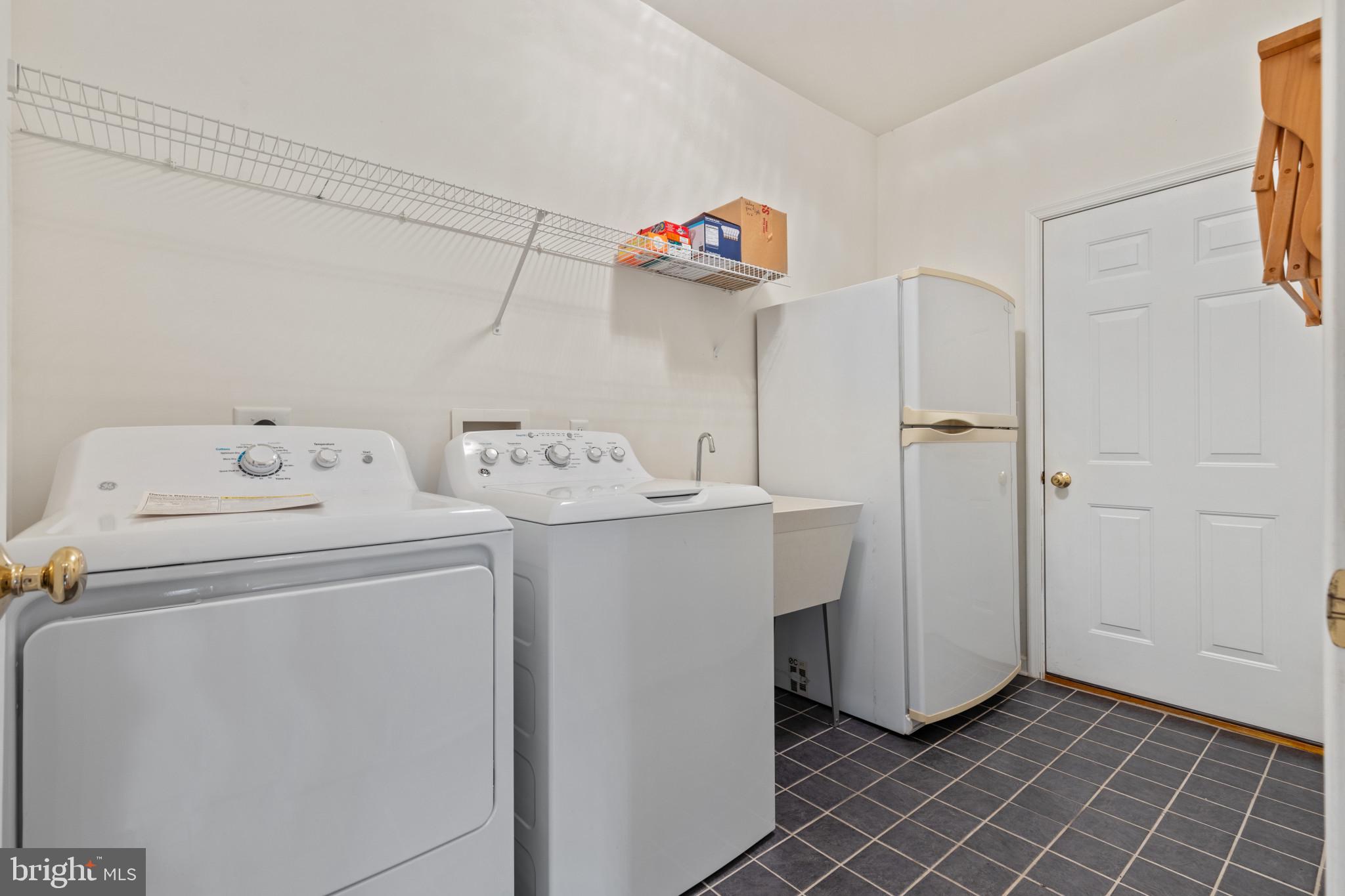 203 Beck Farm Road Centreville, MD 21617 - Photo 10 of 46 Laundry room with sink, washer/dryer & extra frig