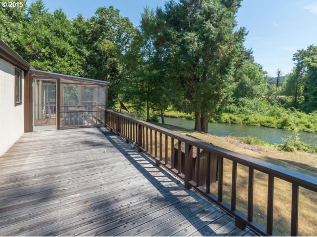 39378 Jasper Lowell Road Lowell, OR 97452 - Photo 13 of 16 a balcony with wooden floor and fence
