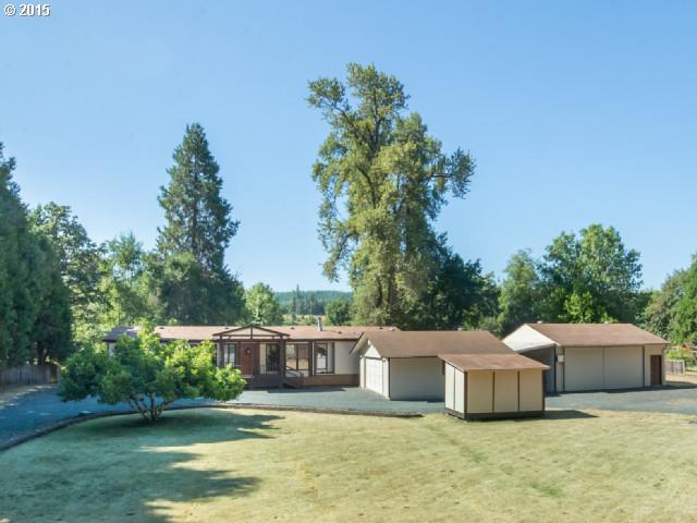 39378 Jasper Lowell Road Lowell, OR 97452 - Photo 2 of 16 a view of a house with a yard and sitting area