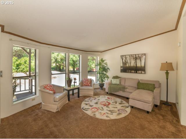 39378 Jasper Lowell Road Lowell, OR 97452 - Photo 5 of 16 a living room with furniture and a large window