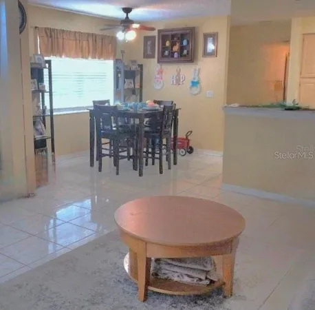 a room with furniture and a chandelier