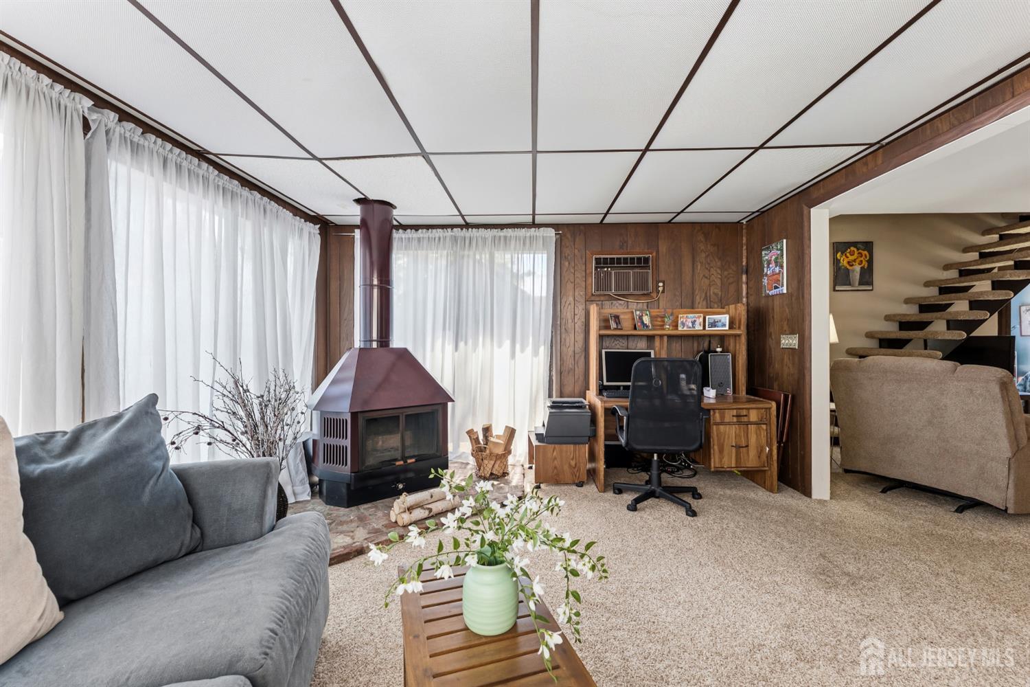 14 Sunrise Road Old Bridge, NJ 08857 - Photo 20 of 32 a living room with furniture and a wooden floor