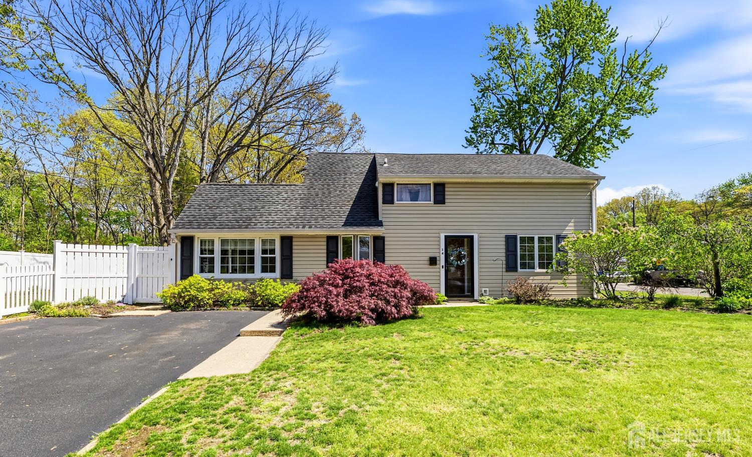 14 Sunrise Road Old Bridge, NJ 08857 - Photo 2 of 32 a front view of house with yard and green space