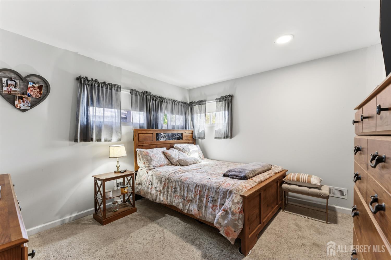 14 Sunrise Road Old Bridge, NJ 08857 - Photo 23 of 32 a bedroom with a bed and a night stand