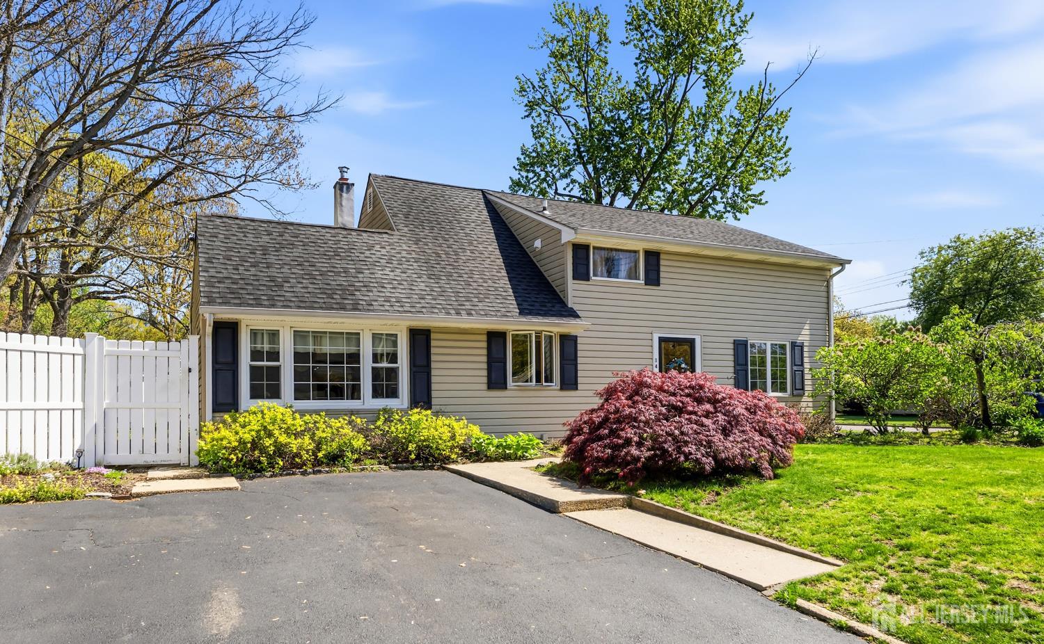 14 Sunrise Road Old Bridge, NJ 08857 - Photo 3 of 32 a front view of house with yard and green space