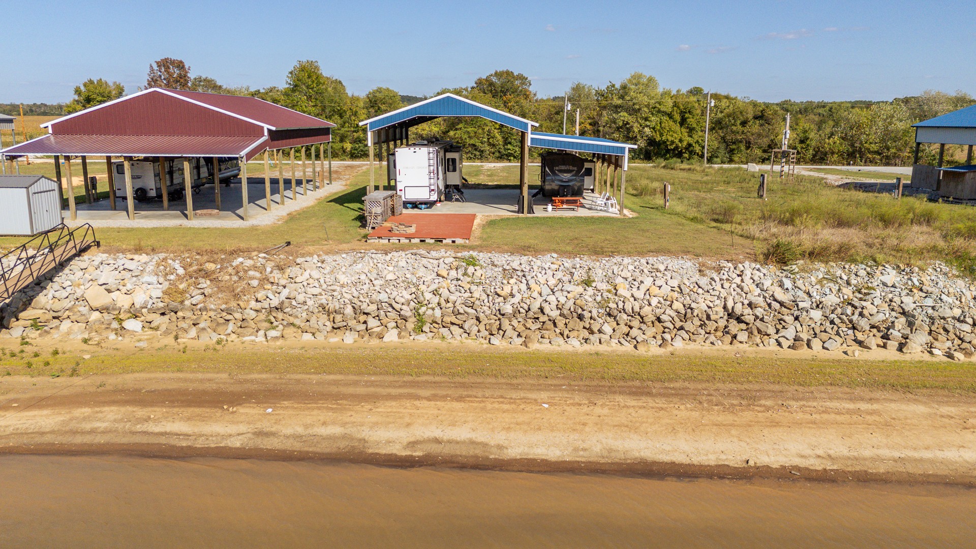 1997 Hardin Bottom River Road Clifton, TN 38425 - Photo 19 of 50 a front view of a house with a yard and lake view