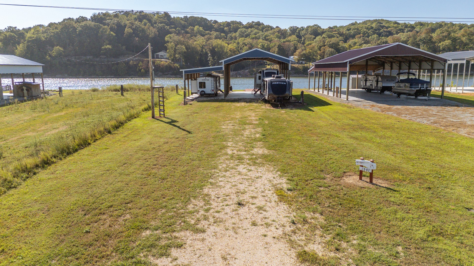 1997 Hardin Bottom River Road Clifton, TN 38425 - Photo 43 of 50 a view of a house with a yard