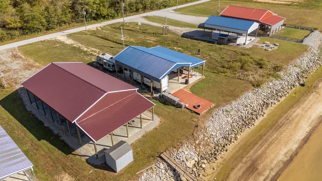 a aerial view of a house with a yard