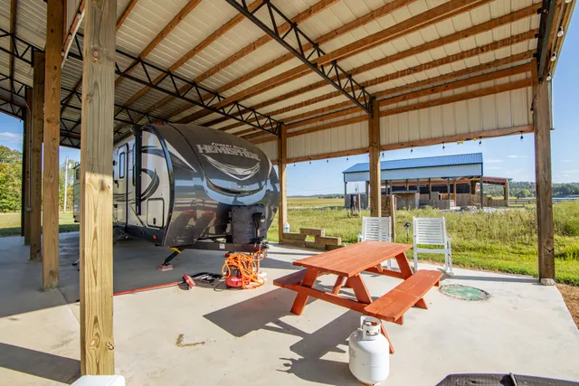 a outdoor space with patio lots of furniture and garden view