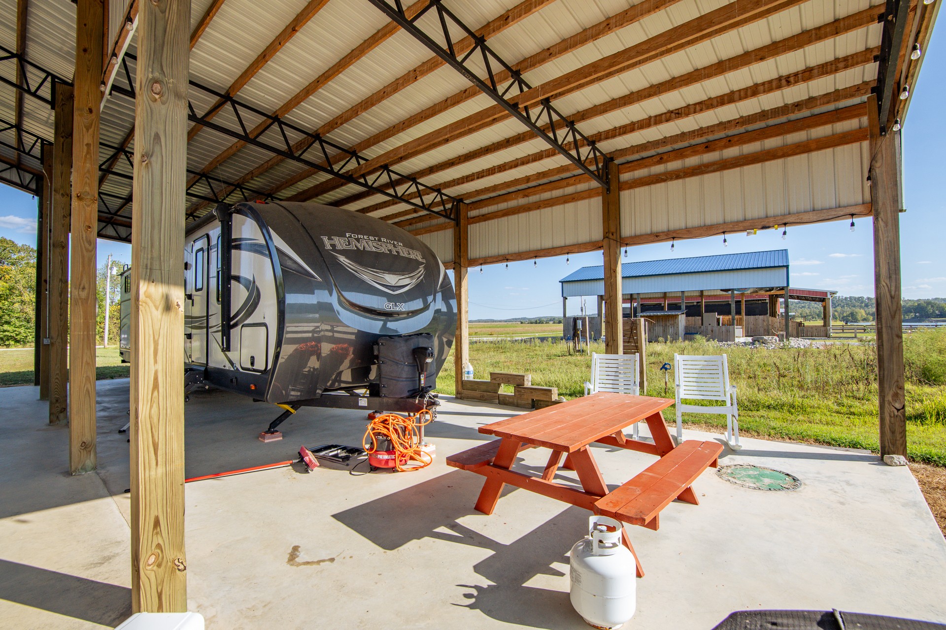 1997 Hardin Bottom River Road Clifton, TN 38425 - Photo 9 of 50 a outdoor space with patio lots of furniture and garden view