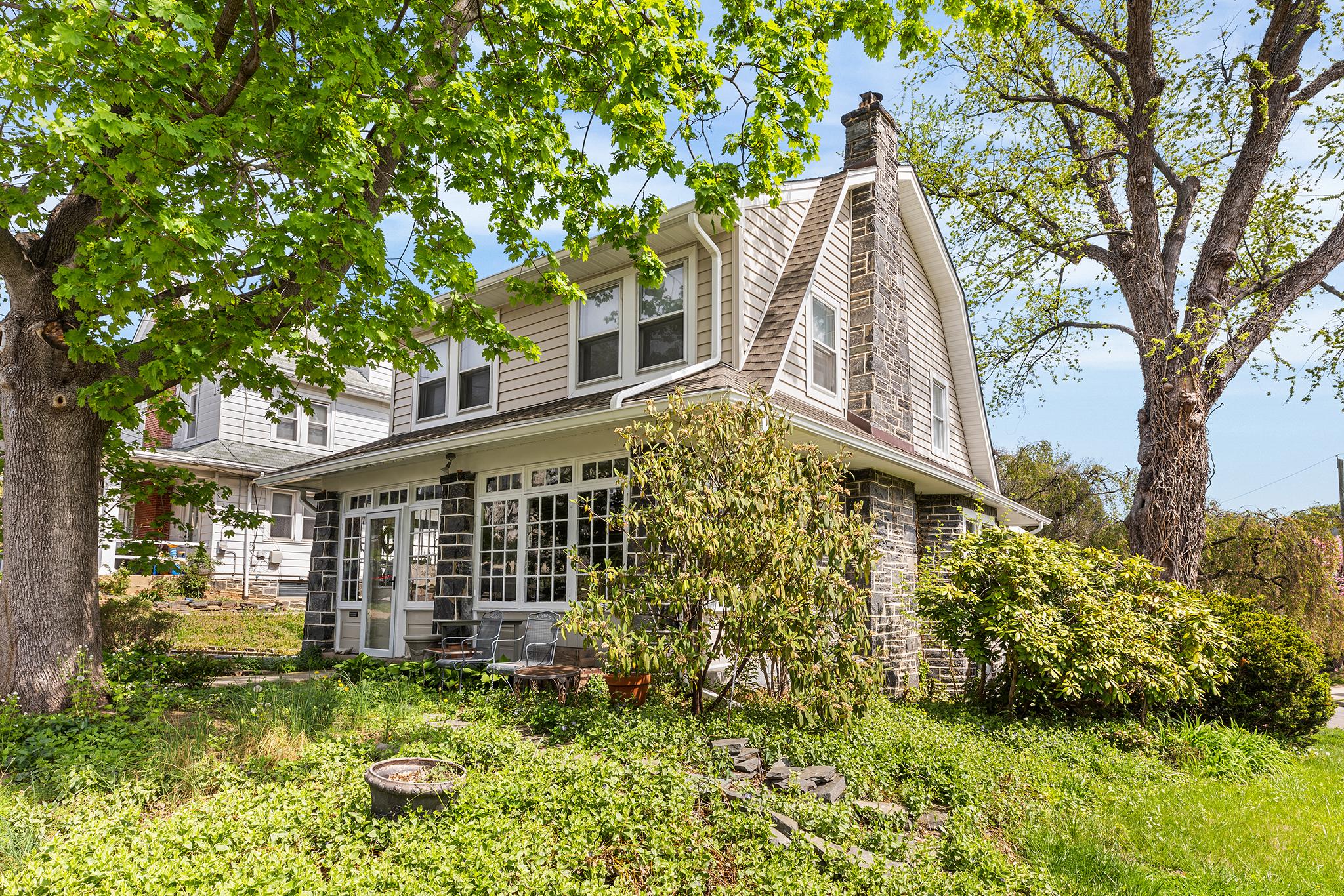 front view of a house with a yard