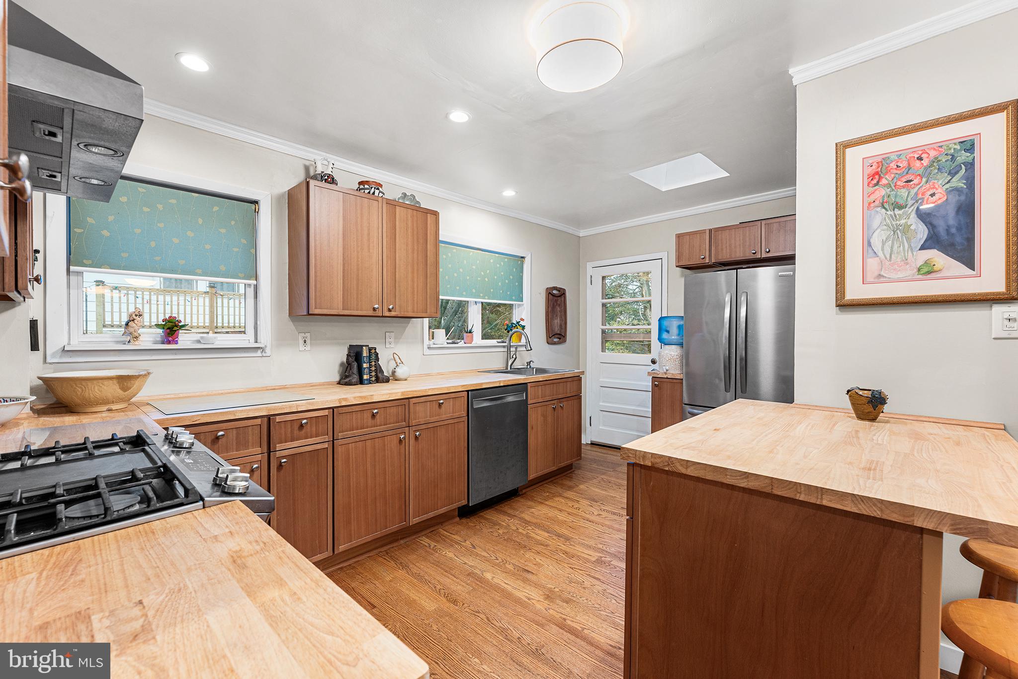 117 Foster Avenue Upper Darby, PA 19082 - Photo 24 of 30 a kitchen with stainless steel appliances a sink stove and refrigerator
