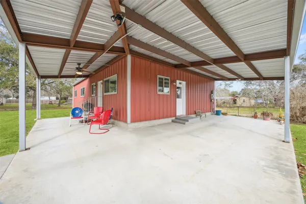 a view of a room with wooden walls