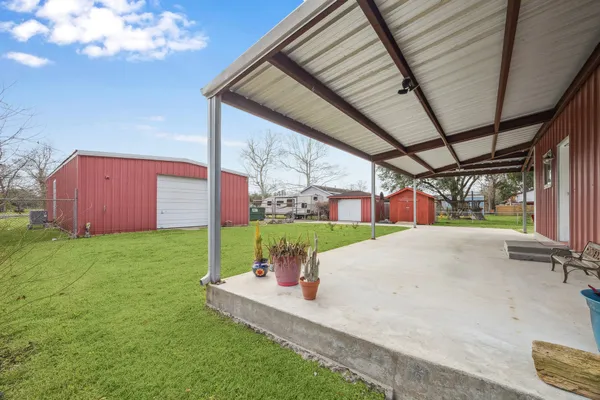a view of backyard with green space