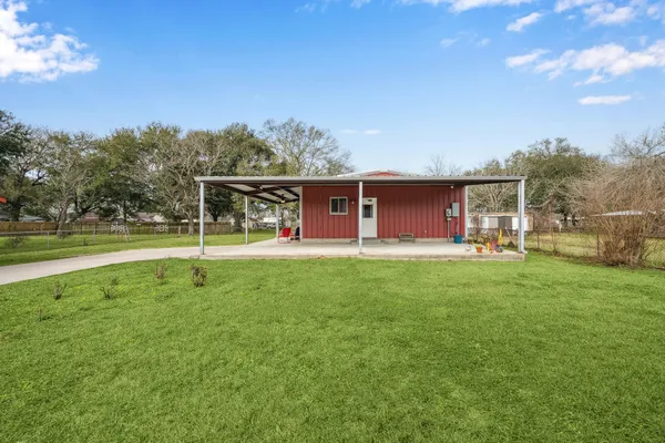 a front view of a house with yard
