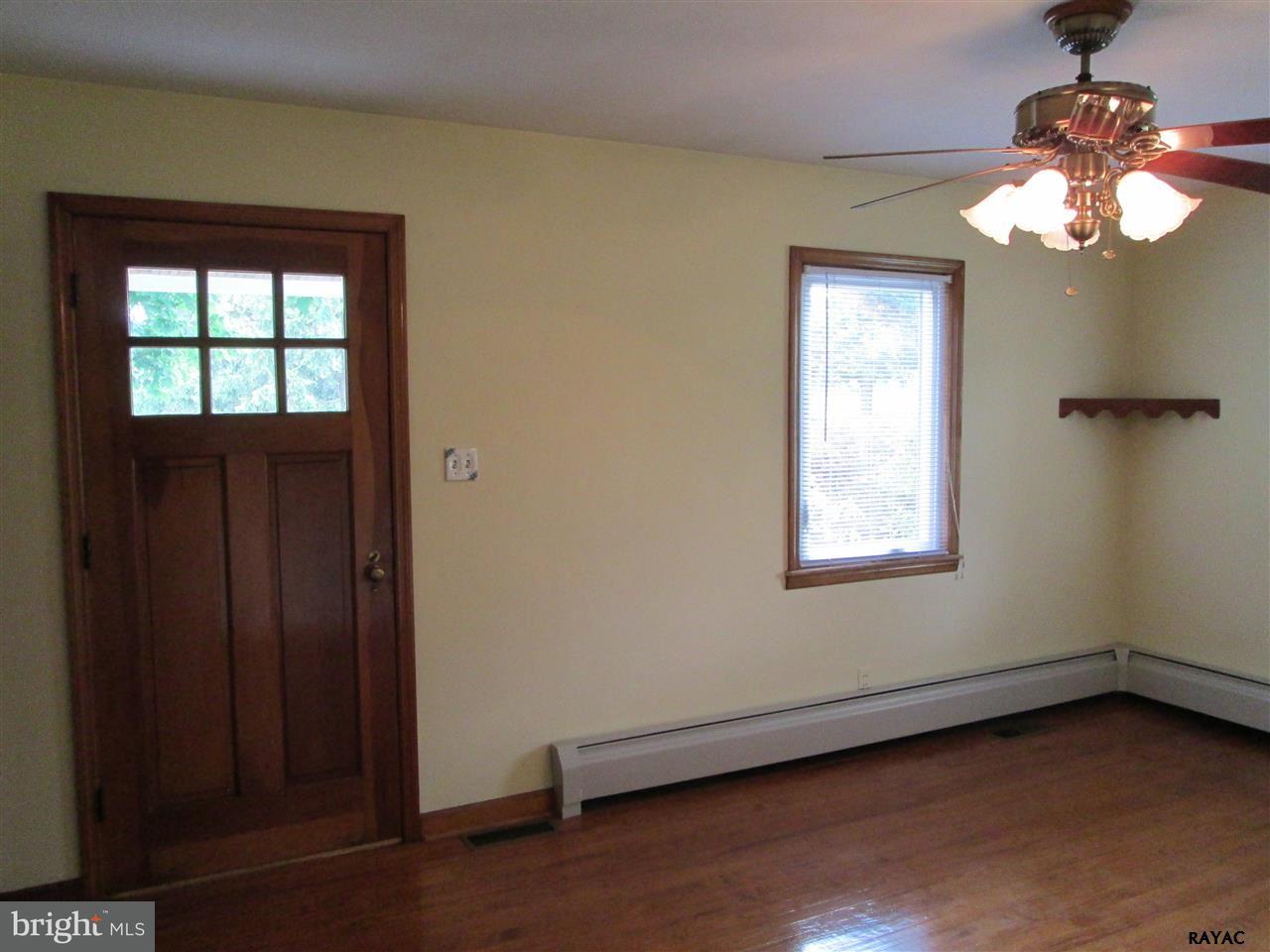 881 Pine Grove Road Hanover, PA 17331 - Photo 11 of 35 wooden floor in an empty room with a window