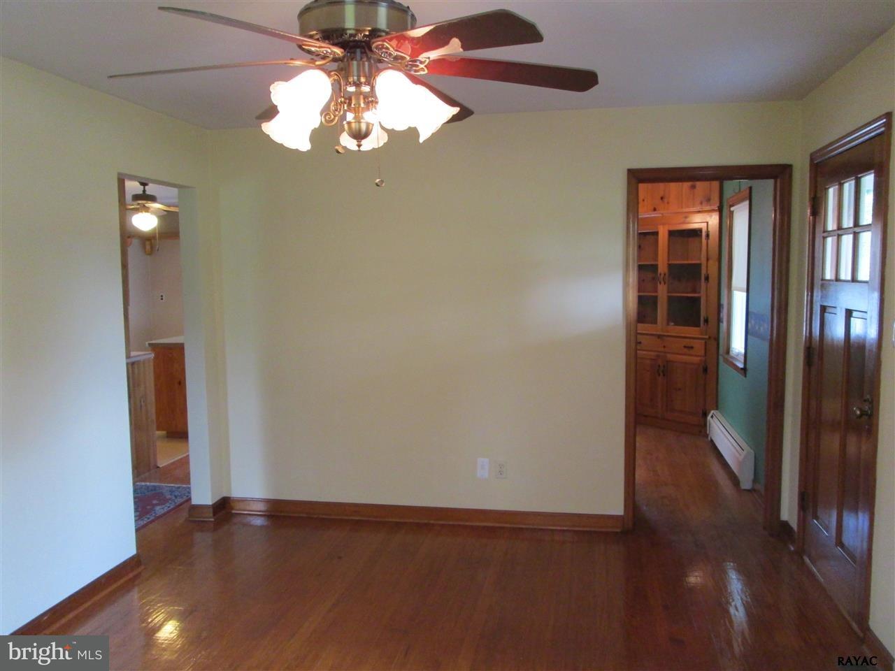 881 Pine Grove Road Hanover, PA 17331 - Photo 13 of 35 wooden floor in an empty room with a window