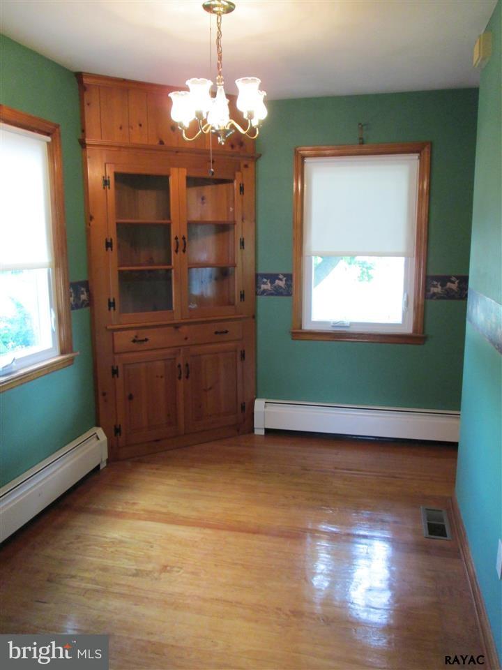 881 Pine Grove Road Hanover, PA 17331 - Photo 14 of 35 a view of a room with a windows and chandelier
