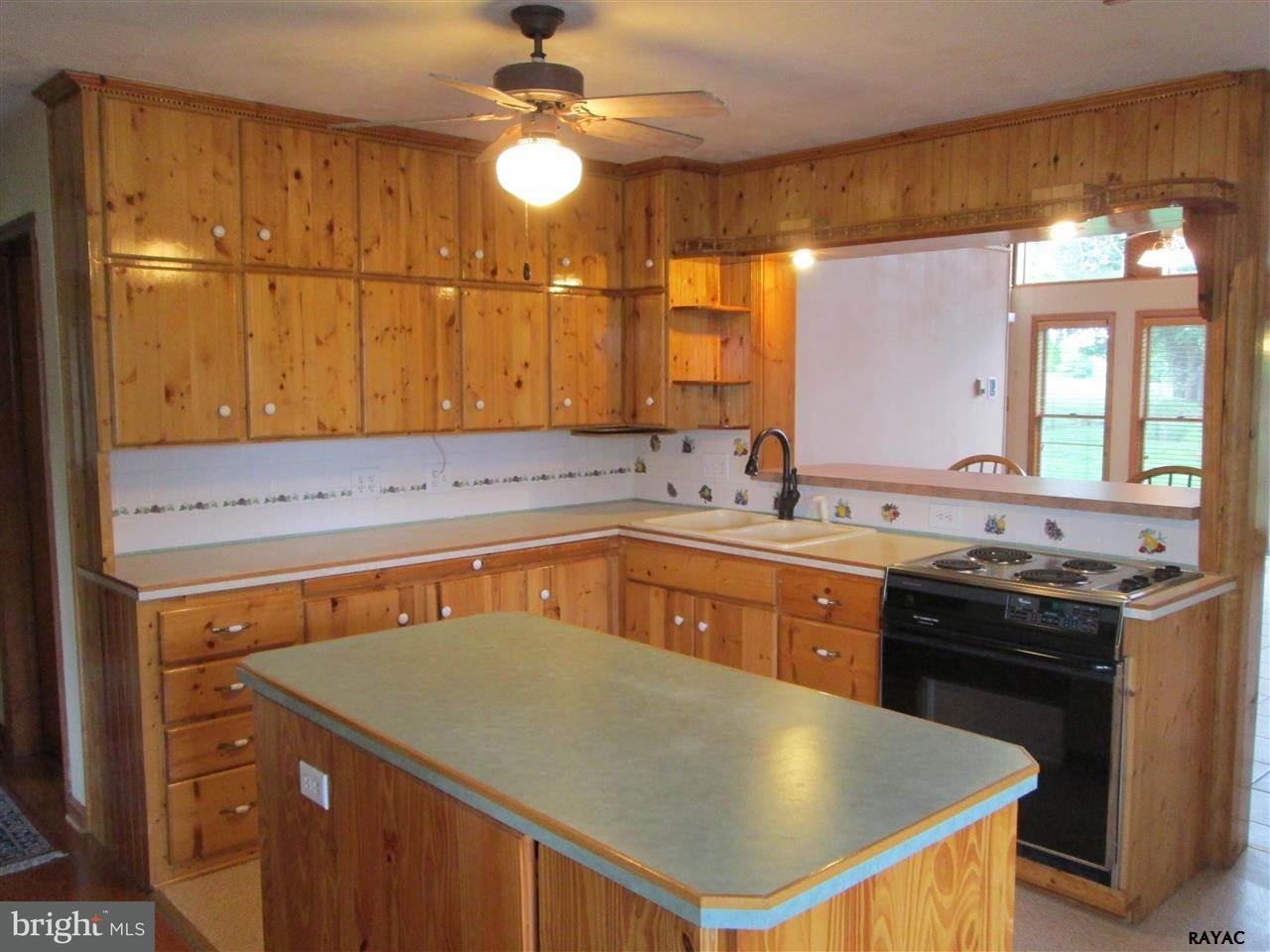 881 Pine Grove Road Hanover, PA 17331 - Photo 15 of 35 a kitchen with stainless steel appliances granite countertop a sink a stove and a refrigerator