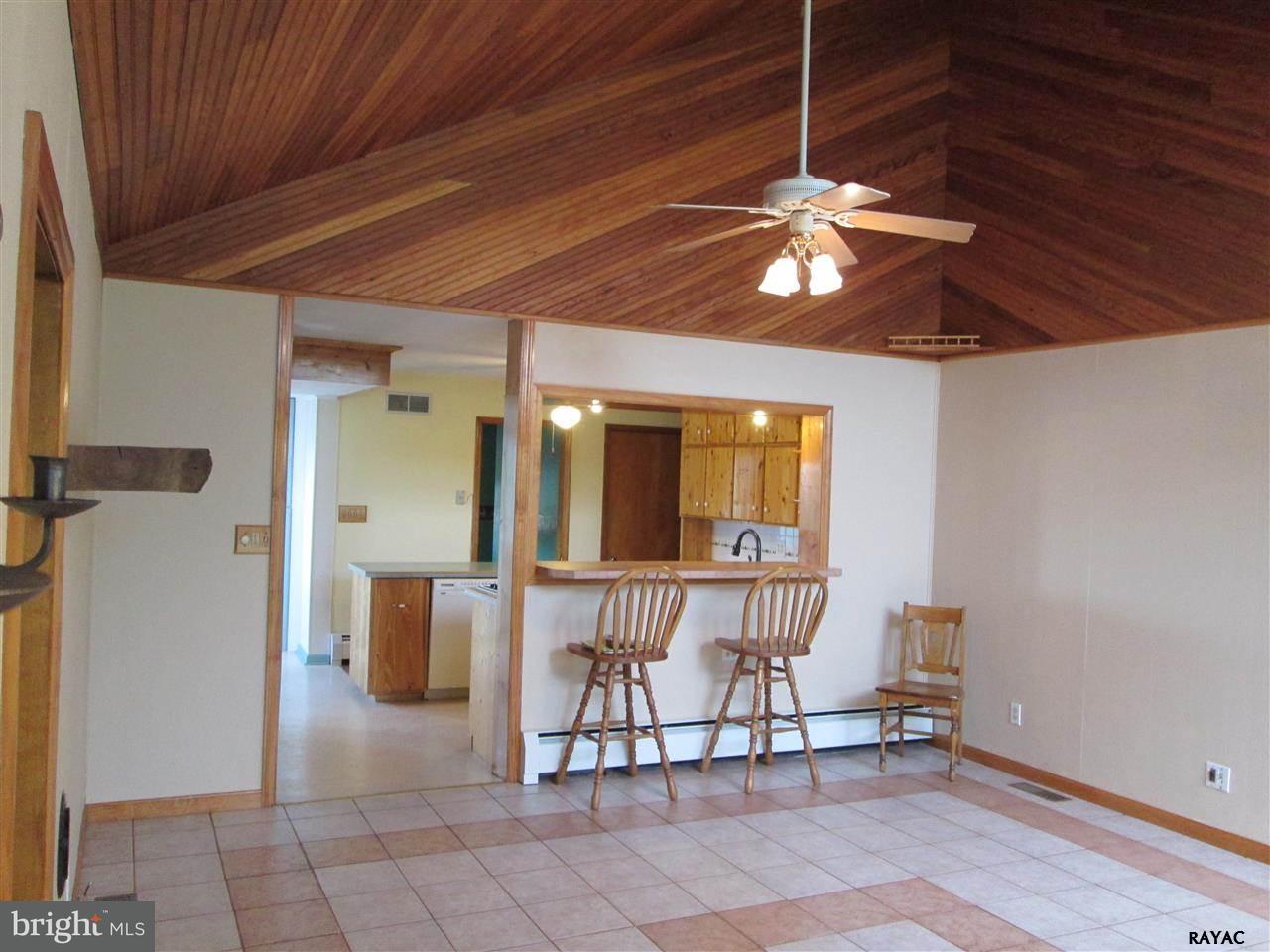 881 Pine Grove Road Hanover, PA 17331 - Photo 19 of 35 a view of a dining room with furniture and chandelier