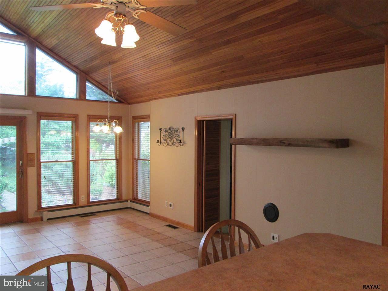 881 Pine Grove Road Hanover, PA 17331 - Photo 21 of 35 a view of a livingroom with a ceiling fan and window