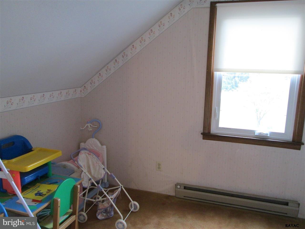881 Pine Grove Road Hanover, PA 17331 - Photo 32 of 35 a room with gym equipment and a window