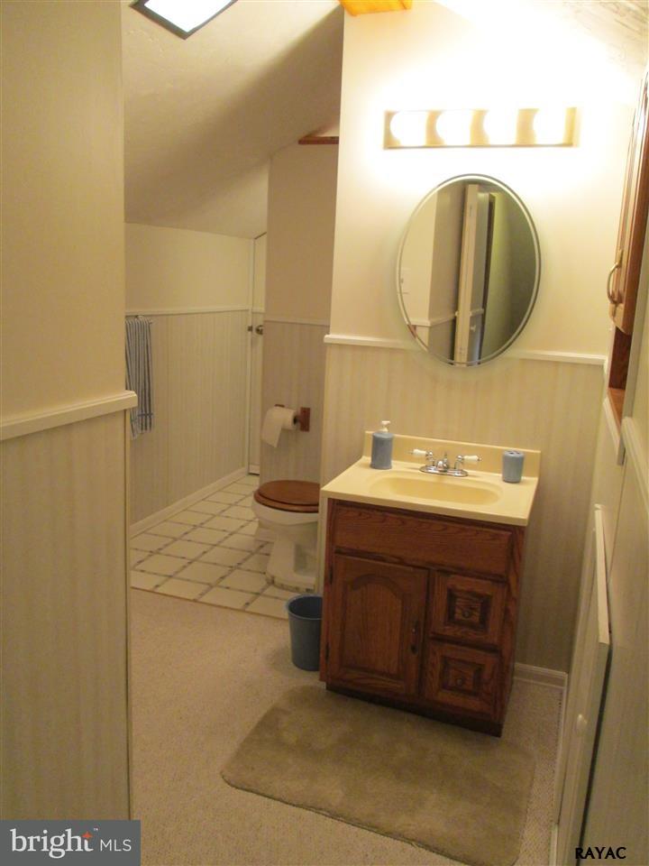 881 Pine Grove Road Hanover, PA 17331 - Photo 33 of 35 a bathroom with a sink and a mirror