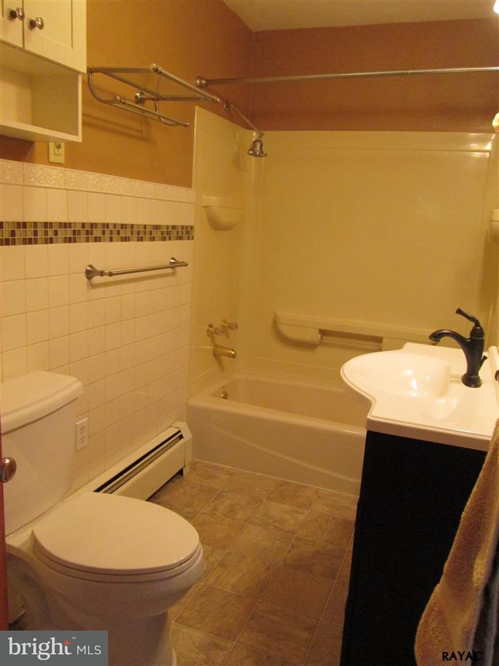 881 Pine Grove Road Hanover, PA 17331 - Photo 34 of 35 a bathroom with a sink a toilet and a shower