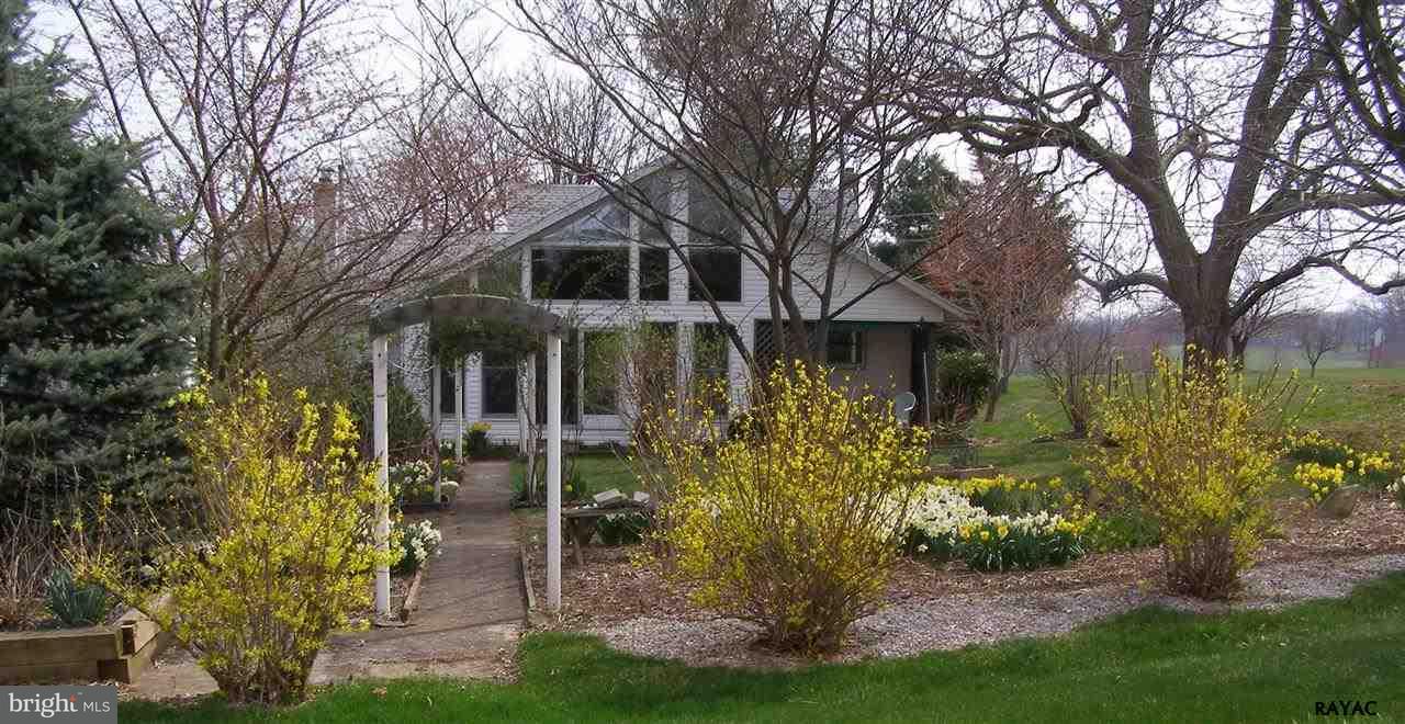 881 Pine Grove Road Hanover, PA 17331 - Photo 7 of 35 a front view of a house with garden