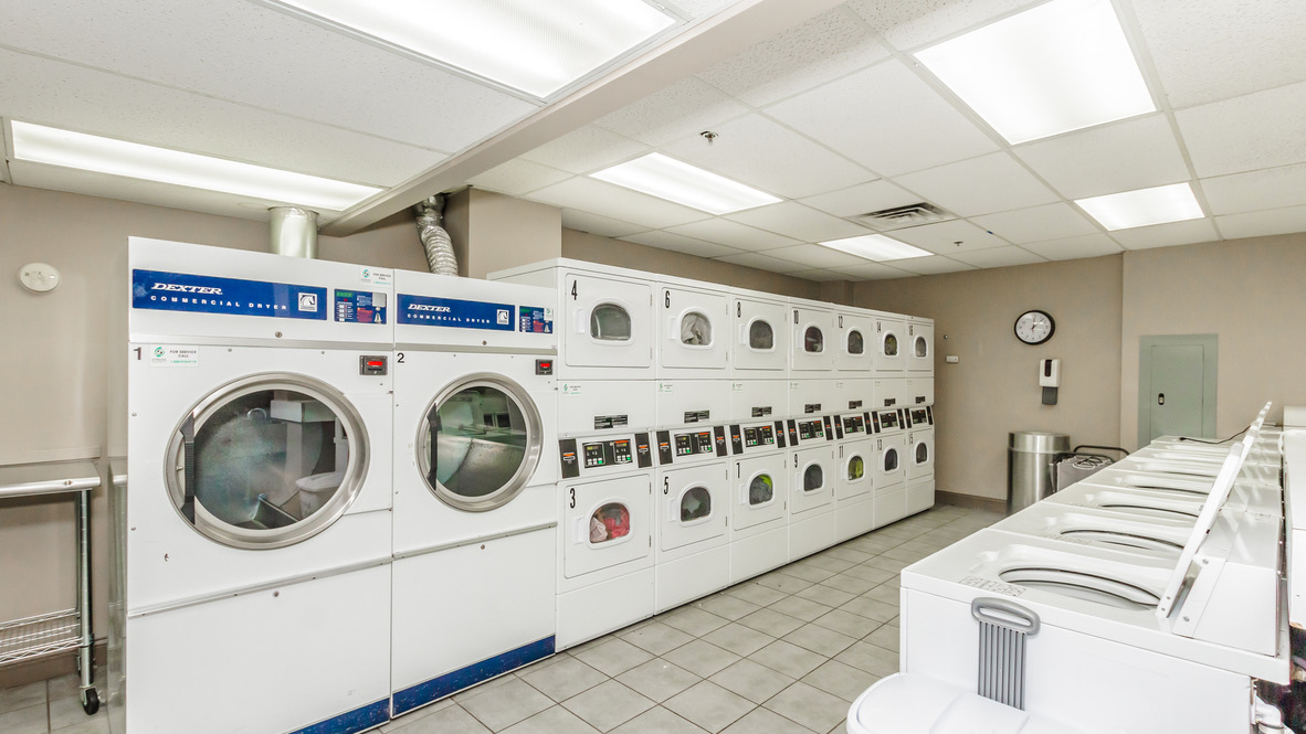 5320 North Sheridan Road, Unit 2001 Chicago, IL 60640 - Photo 11 of 14 a utility room with dryer and washer