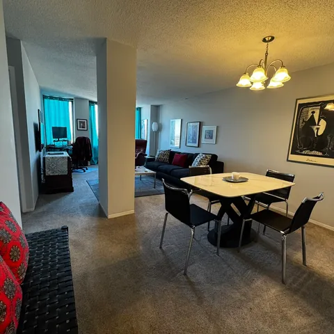 a view of a dining room with furniture