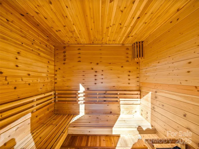 a view of swimming pool with a patio