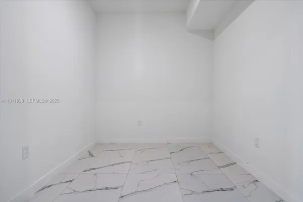 a view of a room with an empty space