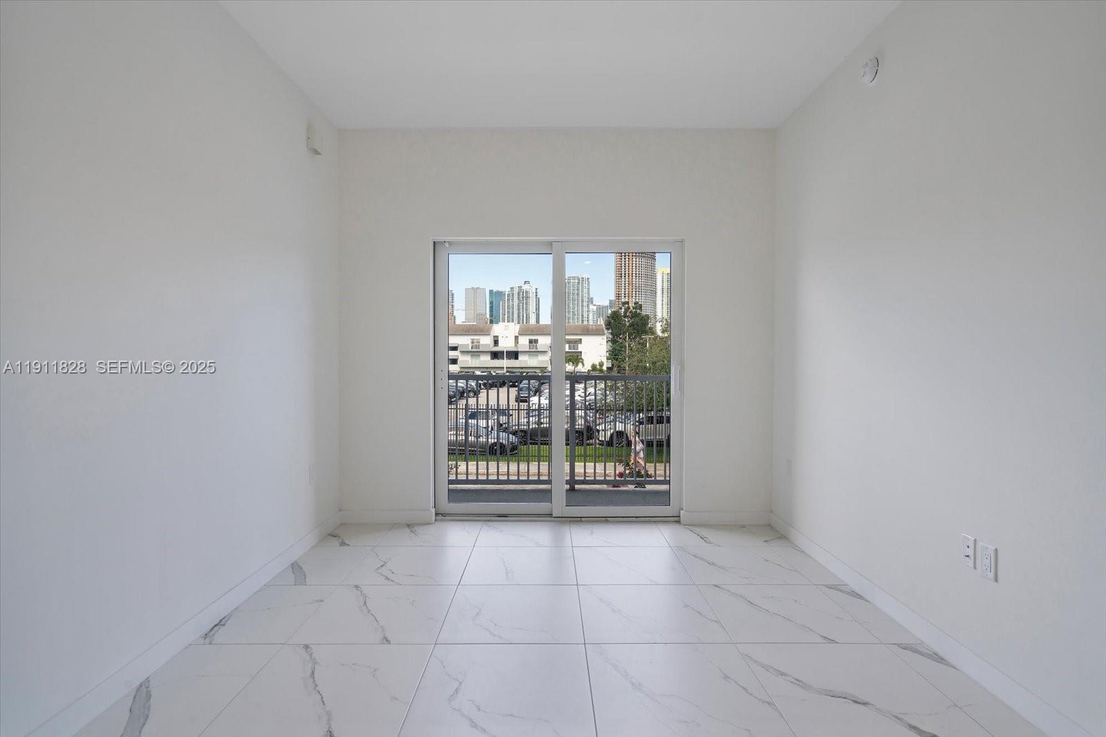 420 Southwest 7th Avenue, Unit 203 Miami, FL 33130 - Photo 8 of 15 a view of a room with window