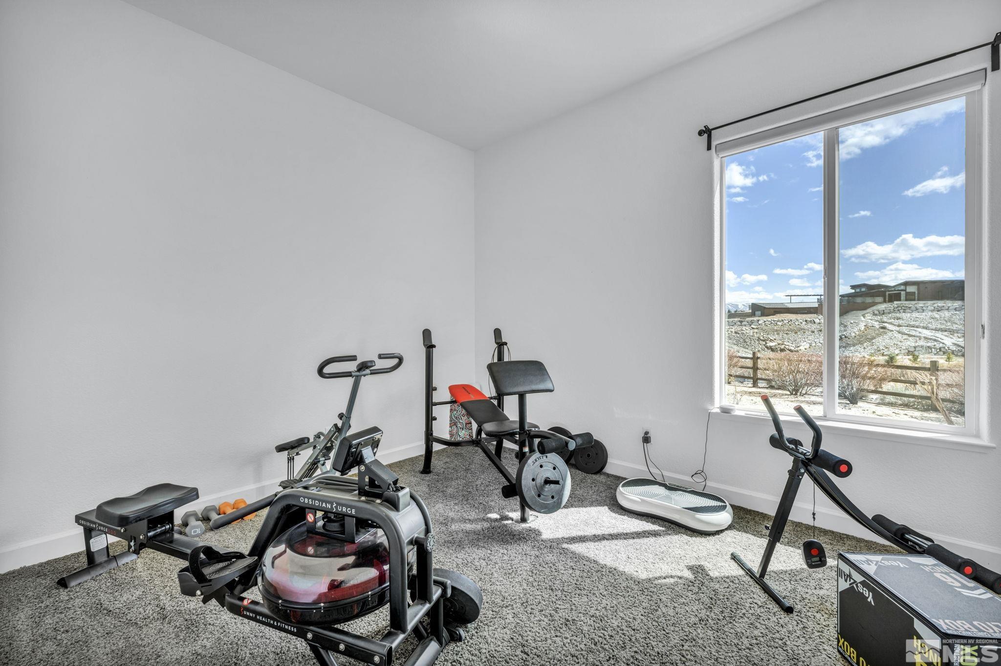 5544 New Mexico Court Reno, NV 89511 - Photo 16 of 39 a view of a room with gym equipment