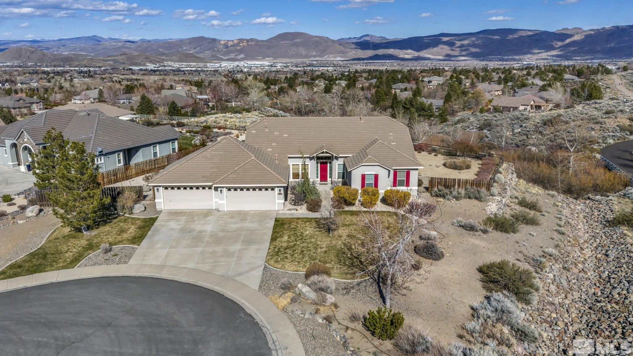 5544 New Mexico Court Reno, NV 89511 - Photo 2 of 39 an aerial view of residential houses with outdoor space