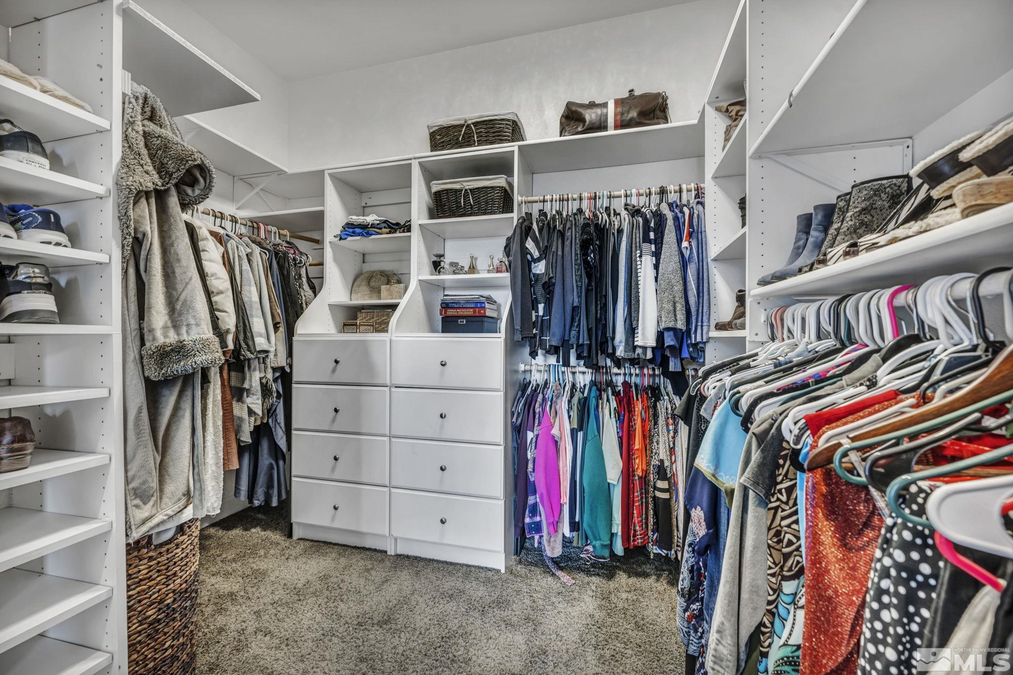 5544 New Mexico Court Reno, NV 89511 - Photo 23 of 39 a view of walk in closet with clothes
